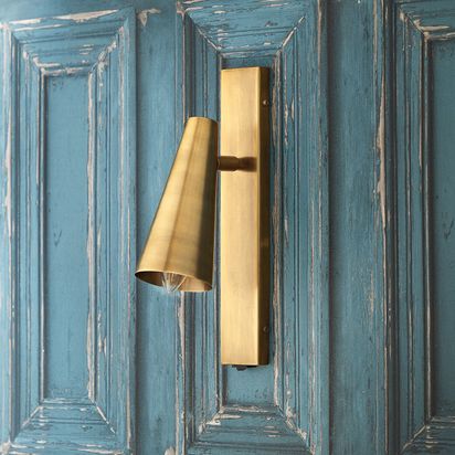Victor wall light in antique brass