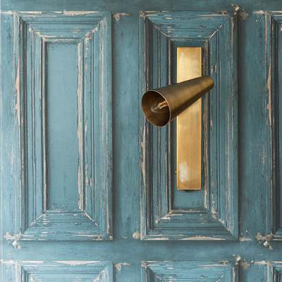 Victor wall light in antique brass
