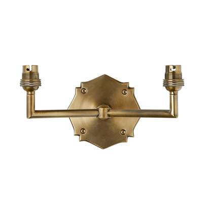 double insignia wall fitting in antique brass