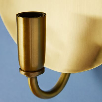 Moon wall light in antique brass