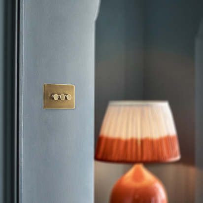 Three gang 2 way Florence dimmer switch in brass