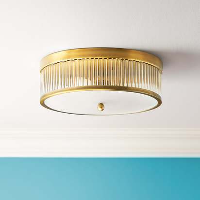 Round Roddy IP44 flush ceiling light in antique brass and clear glass