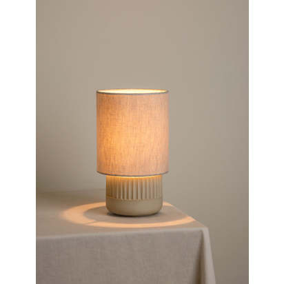 Enza - warm white ribbed concrete table lamp