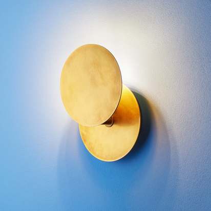 Franz wall light in aged brass finish