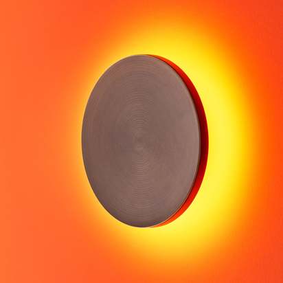 Larger Helios rechargeable wall light in bronze