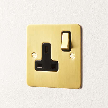 Lucian single socket with black inserts in top brass