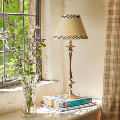 Spindle rechargeable table lamp in aged brass