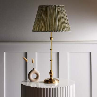 Chukka rechargeable table lamp in antique brass