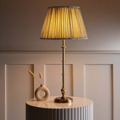 Chukka rechargeable table lamp in antique brass