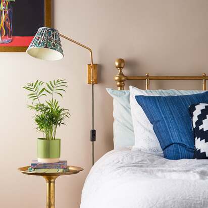 Carter Wall Fitting in Antique Brass