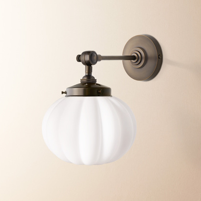 Elbow wall fitting in antiqued bronze