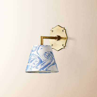 single insignia wall fitting in antique brass