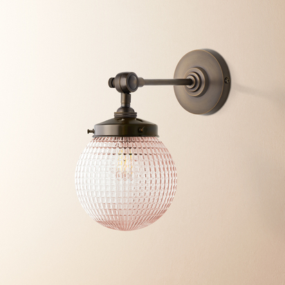 Elbow wall fitting in antiqued bronze