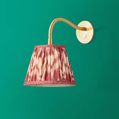 Phoebe flexible wall arm in antique brass