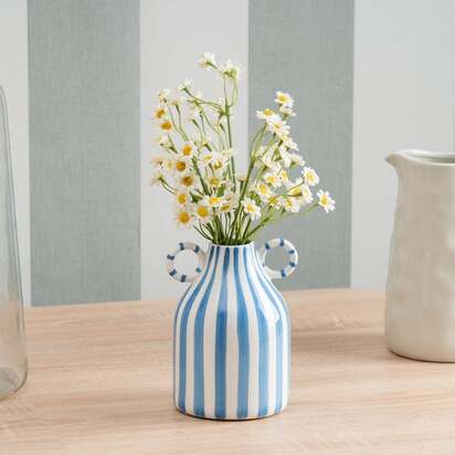Artificial Daisies in a Ceramic Vase