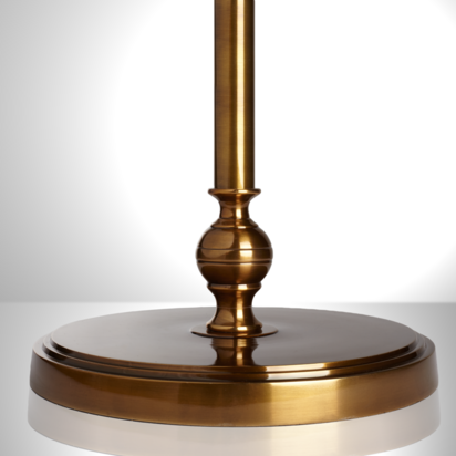 Chukka floor lamp in antiqued brass