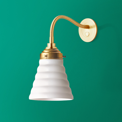 Phoebe flexible wall arm in antique brass