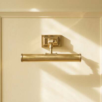 Smaller Pitcheroo picture light in antique brass