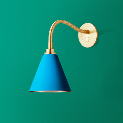 Phoebe flexible wall arm in antique brass