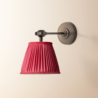 Elbow wall fitting in antiqued bronze