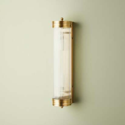 Long Roddy IP44 wall light in brass with glass rods