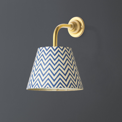 Minnow wall fitting in antique brass