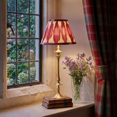 Spindle rechargeable table lamp in aged brass