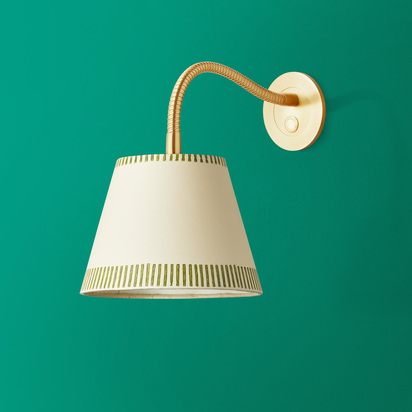 Phoebe flexible wall arm in antique brass