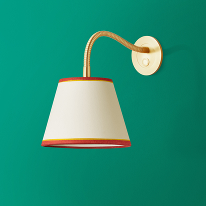 Phoebe flexible wall arm in antique brass