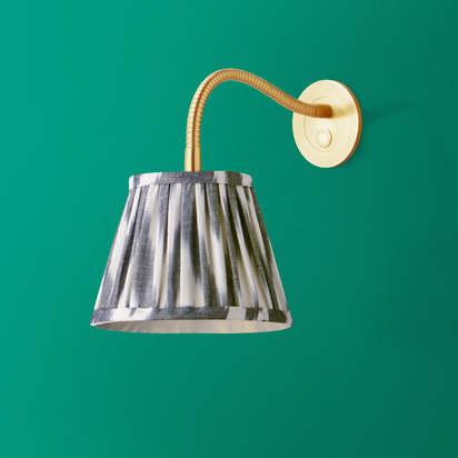 Phoebe flexible wall arm in antique brass