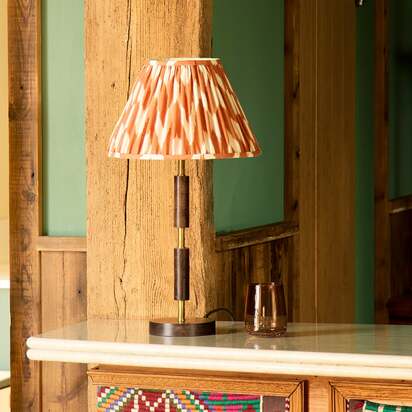 Skellig table lamp in burnt wood and brass
