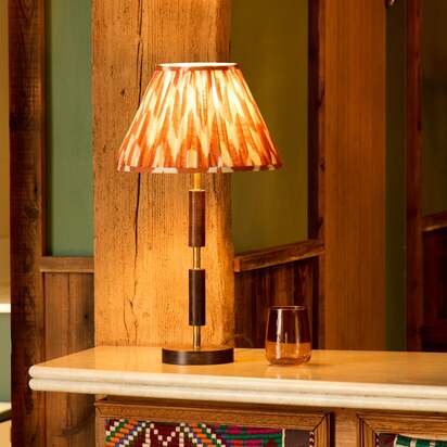 Skellig table lamp in burnt wood and brass