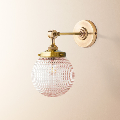 Elbow wall fitting in antiqued brass