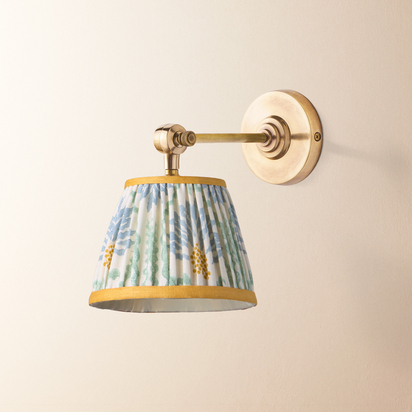 Elbow wall fitting in antiqued brass