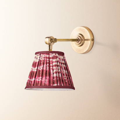 Elbow wall fitting in antiqued brass