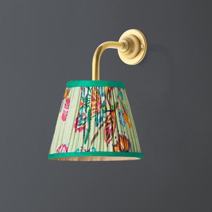 Minnow wall fitting in antique brass