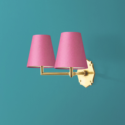 double insignia wall fitting in antique brass
